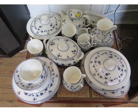 A Royal Doulton Yorktown pattern dinner and tea service including teapot, two tureens, serving plates and oval tureen (47 pie
