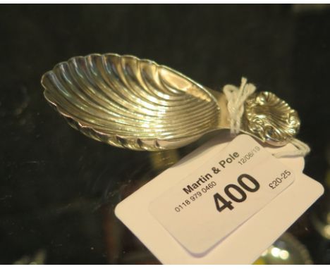 A silver shell shaped caddy spoon, Birmingham 1997