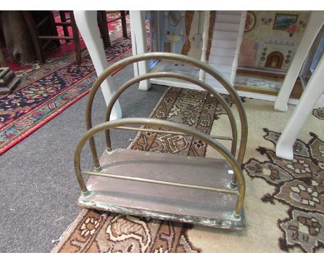 A vintage brass two section magazine rack 