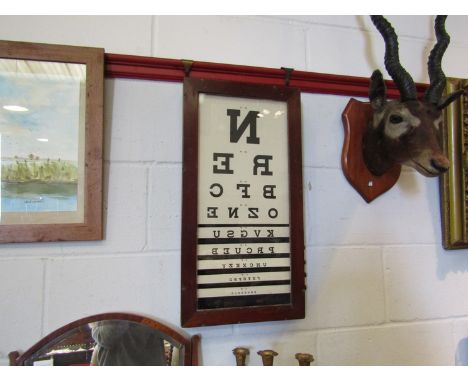 A vintage mahogany cased optician's eye test unit, 62cm x 32cm