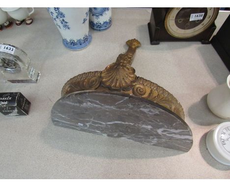 A gilt marble wall bracket