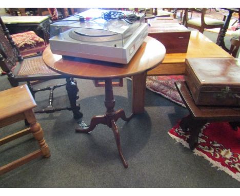 A George III mahogany circular tilt top wine table on ring turned vase shape column and tripod base, 65cm diameter x 71cm tal