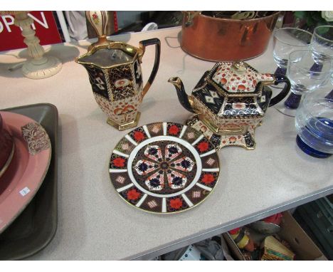 A Royal Crown Derby Imari pattern plate, an Imari pattern teapot on stand and similar jug (3)