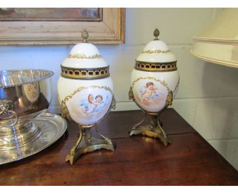 A pair of 19th Century ceramic and ormolu, lidded potpourri urns, 30cm tall