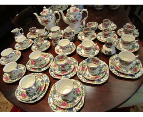 A large collection of Booths Floradora coffeeware including 20 coffee cups and saucers (different shapes) two coffee pots etc