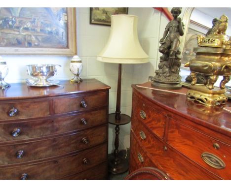 A mahogany lamp standard with dished rim circular table and shade