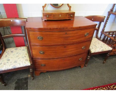 A mid Victorian flame mahogany bow front chest of three graduating long drawers on bracket feet, 85cm x 92cm x 51cm