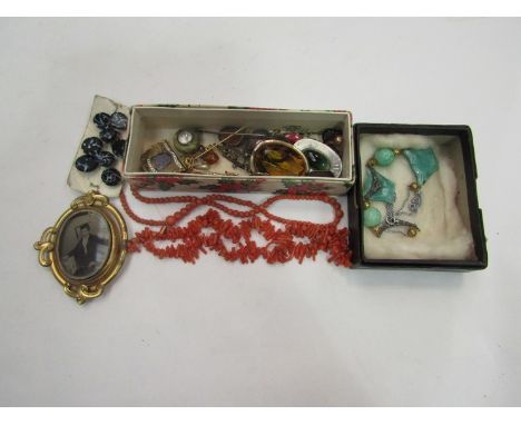 A small quantity of jewellery including coral bead necklaces, brooches, jade style necklace etc