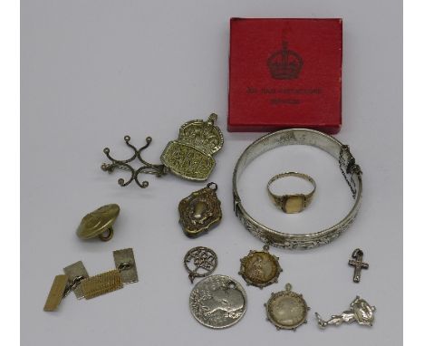 A silver bangle, a hallmarked silver coin mount brooch, an ARP badge with box, etc.