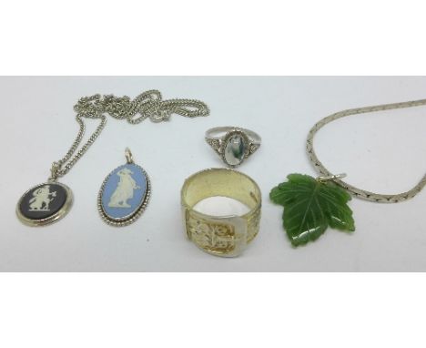 A jade pendant on a silver chain, two Wedgwood pendants, a silver buckle ring and an agate and silver ring