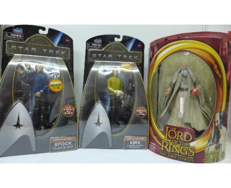 Two Star Trek figures and a Lord of The Rings figure Saruman and The White