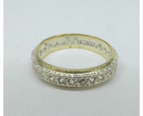 A 9ct gold and silver white stone eternity ring, K, hallmark worn