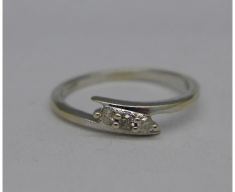 A 9ct white gold and diamond ring, 1.8g, O