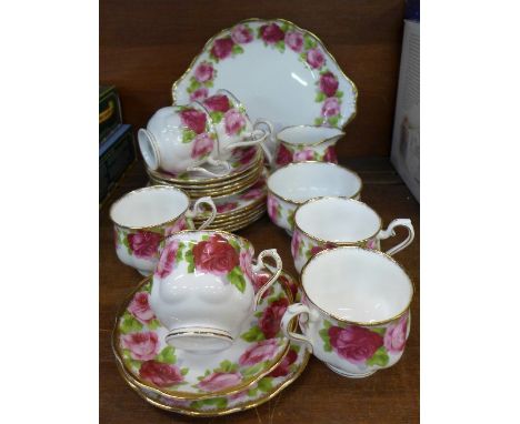 A Royal Albert Old English Rose six setting tea service with cream, sugar and sandwich plate (21)