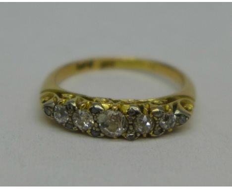 An 18ct gold and diamond ring, 3.6g, O