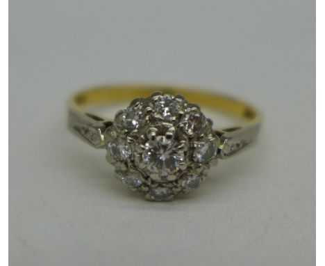 An 18ct gold, platinum and diamond ring, 3.6g, O