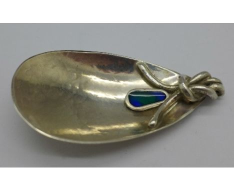 A silver Arts and Crafts style caddy spoon, Birmingham 2016, JSS