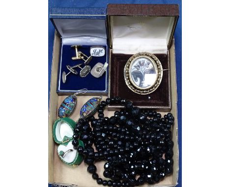 A quantity of Vintage jewellery, to include a 19th century gilt-metal memorial brooch with hair panel, silver cufflinks etc 