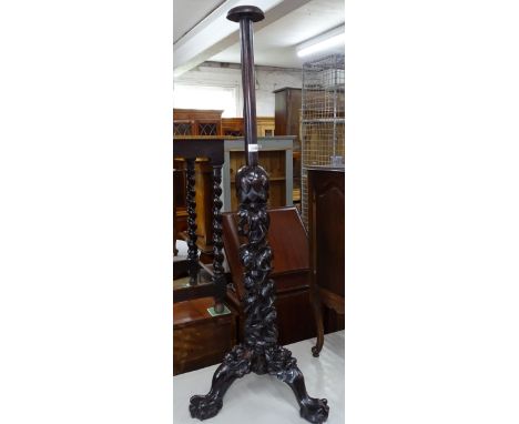 A Chinese hardwood hat stand, on a relief figural carved tripod base, H120cm 