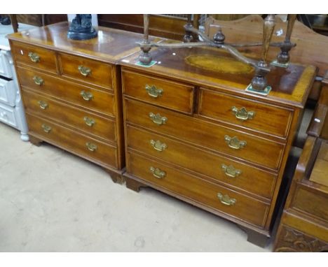 A pair of reproduction mahogany and satinwood-banded 5-drawer chests, the top having oval marquetry inlaid decoration, with c