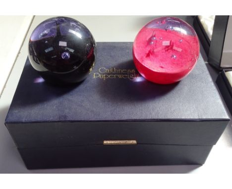 A pair of boxed Caithness paperweights - Dawn and Dusk 594/750 