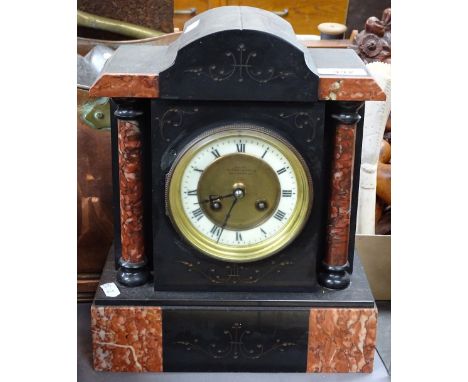 A slate and marble-based mantel clock by Whitmore, Northampton, 11.5" 