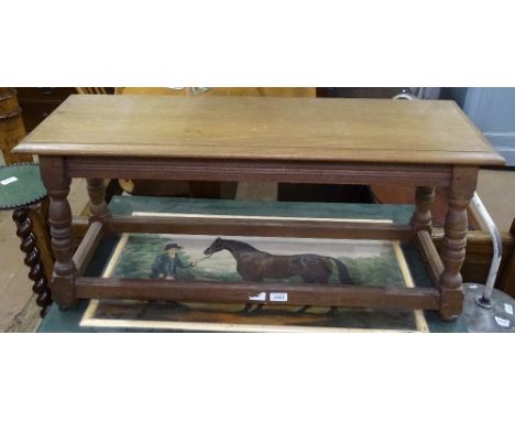 A 1920s joined oak long stool on turned legs, L90cm 