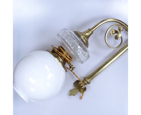 A brass oil lamp with chimney and shade 