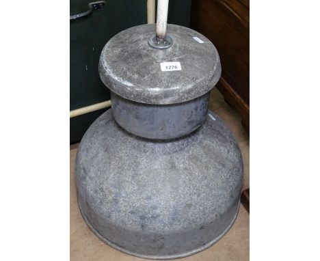 An industrial metal hanging light fitting 