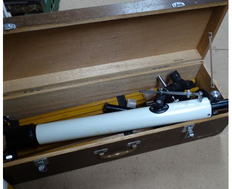 A Japanese telescope with adjustable wooden tripod stand, in wooden case 