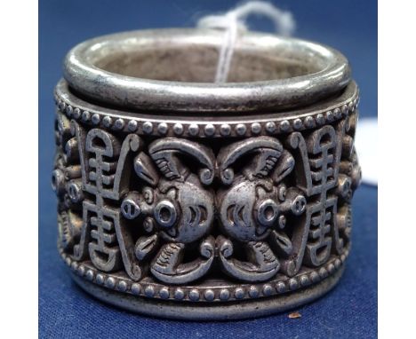 A Chinese pierced and embossed silver ring 