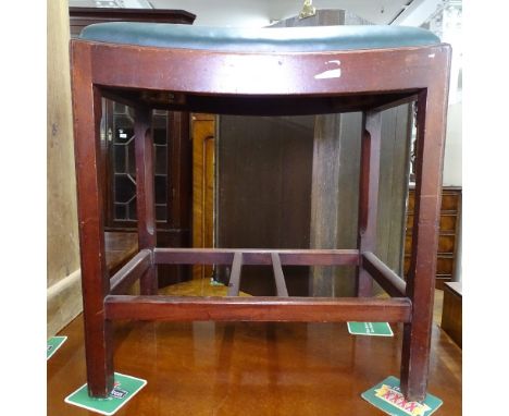 A Victorian mahogany dressing stool with green leather seat 