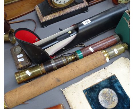 A Greenkat scope in case, a lamp, and 3 telescopes 