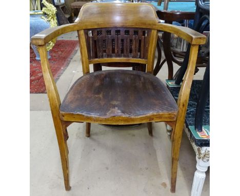 An Otto Wagner J&amp;J Kohn, Vienna, secessionist bentwood armchair, with remains of paper label and stamp to seat frame 