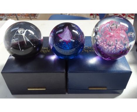 2 boxed Caithness paperweights, Pirouette and Carousel, both with certificates, and another paperweight 