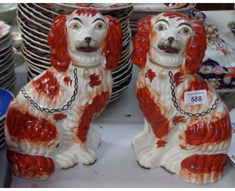 A pair of Staffordshire mantel Spaniels, 10" 