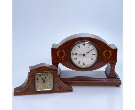 An Edwardian inlaid mantel clock on plinth, length 10", and a smaller marquetry decorated French clock (2) 