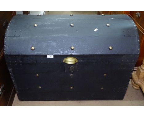 A Victorian stained pine dome-top trunk, with stud work decoration 