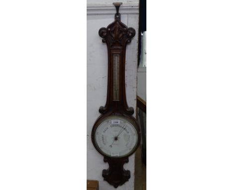 A Victorian carved oak aneroid barometer, by Langley of Tunbridge Wells, L83cm 