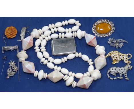 A tray of Vintage jewellery to include amber set pendant, panther design brooches etc 