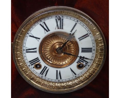 A mahogany-cased mantel clock by Ansonia of New York, 16" overall 
