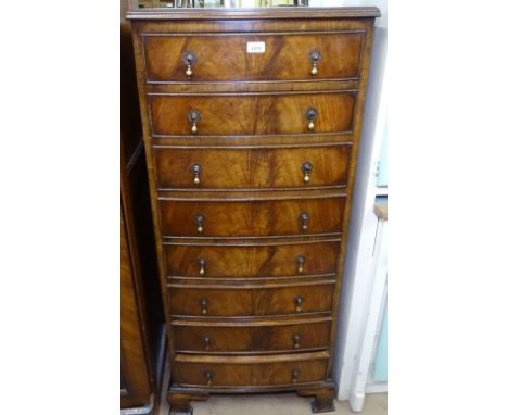 A walnut bow-front narrow chest with 8 short drawers, on bracket feet, W55cm 