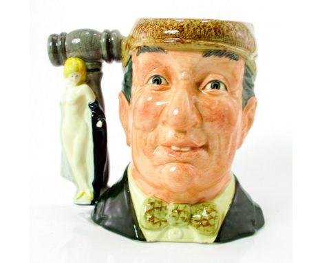 Green coat and bow tie, light brown cap.Commissioned by Kevin Francis Ceramics Ltd., The Auctioneer jug was issued in 1988 in