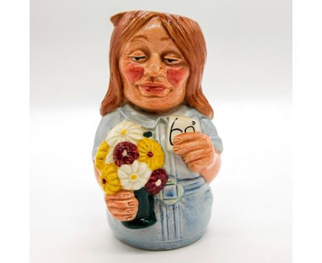 Light blue uniform; brown hair; red, yellow and white flowers.Series: The Doultonville Collection. Royal Doulton backstamp. A