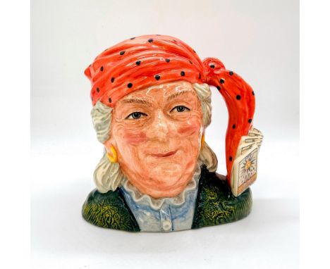 Style Two. Orange polka-dot bandana, light blue shirt. Beginning in 1991, one jug was selected as the Character Jug of the Ye