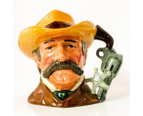 Brown coat; light brown hat with red band.Series: The Wild West Collection. Royal Doulton backstamp. Comes with certificate. 