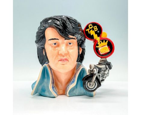 One of Two Prototype of Viva Las Vegas Elvis with motorcycle TCB handle, tall blue collar, and long sideburns. Royal Doulton 