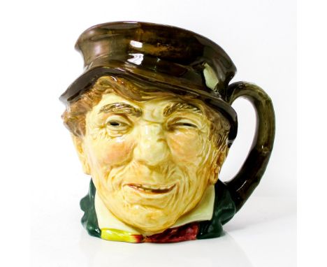 Brown hat, green coat, yellow, and red scarf.Paddy, a colloquial term for an Irishman, is derived from St. Patrick, the count