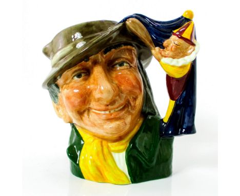 Brown hat; green coat; yellow scarf.Coming to England in the 17th century by way of Italy and France, the Punch and Judy pupp