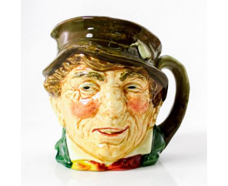 Brown hat; green coat; yellow and red scarf.Paddy, a colloquial term for an Irishman, is derived from St. Patrick, the countr